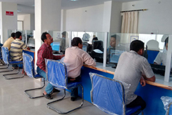 Public and NSK operators seen interacting at the Model NRC Seva Kendra, Noonmati, Guwahati