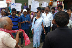 Public gathers during a street play (Bator Naat) on NRC Updation process performed at Palashbari Circle in Kamrup Rural