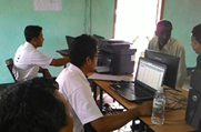 Operators at an NSK in Goalpara District assist the public in looking up for records in the Legacy Data