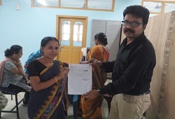 An applicant receiving her acknowledgement receipt at Exe. Engg. NH Divison NSK, in Karimganj on 16th June, 2015.
