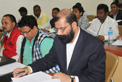 Dr. Samujjal Bhattacharya (extreme right), AASU Advisor along with an AASU Leader during a meeting held on NRC Updation process